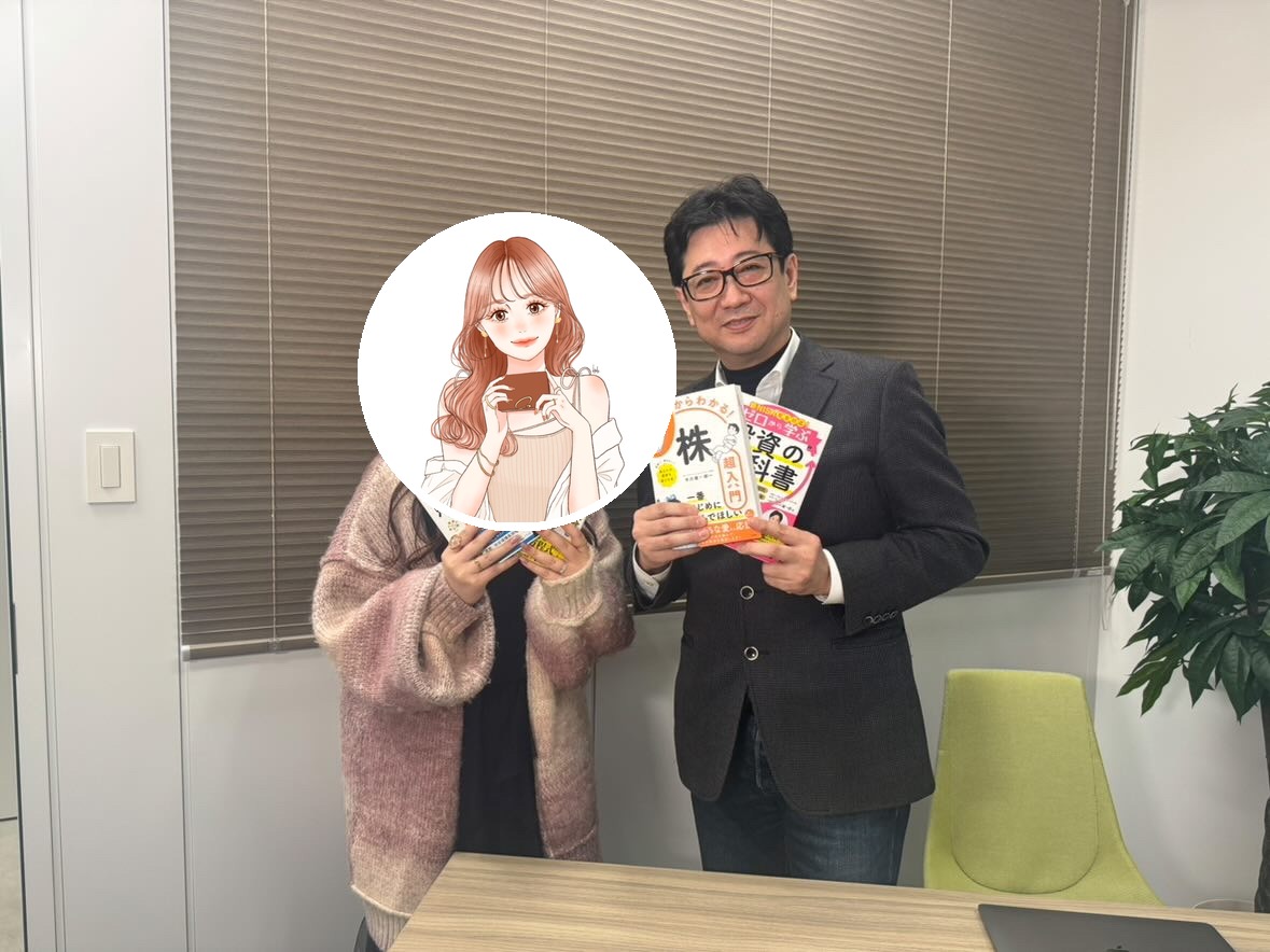 GFS校長・市川雄一郎さんとさくらのツーショット(本を持って記念撮影)